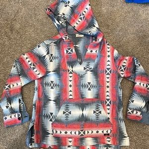Faherty size small woman’s poncho in blue red and white.